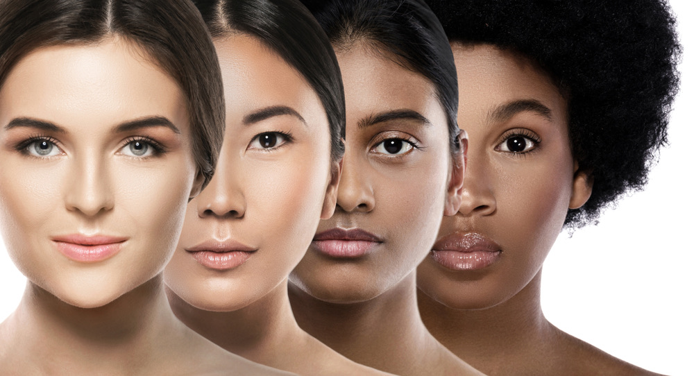 Four women with different skin tones